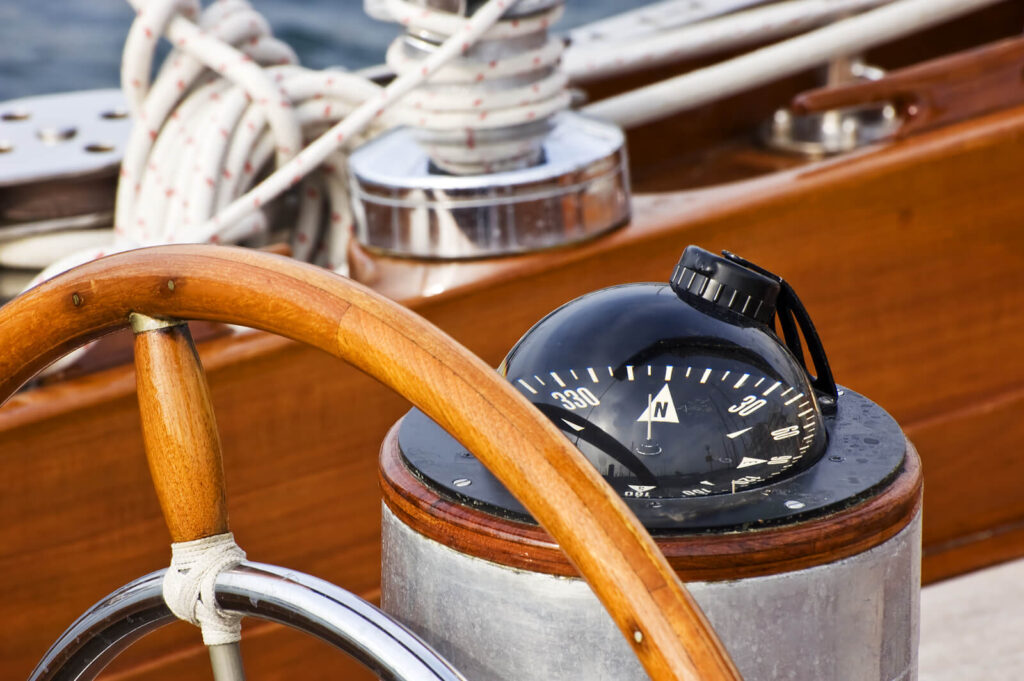 Image of a compass on a boat. When going through a major life change you may find it difficult to move forward. With the help of a skilled life transitions therapist in Manhattan Beach, CA you can begin your healing journey.